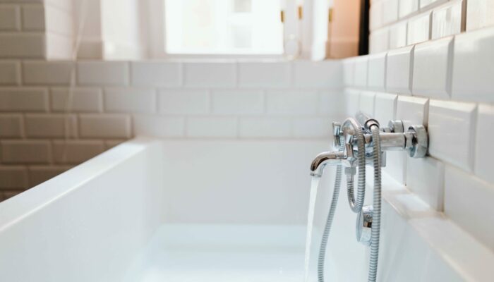 Boiler-repair-PowerPlumbing-BSE (1) modern bathroom with bath running hot water
